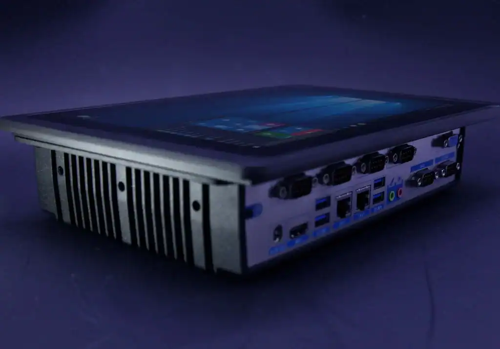 Industrial embedded computer with multiple connectivity ports and a touchscreen display, designed for rugged automation and industrial control applications.