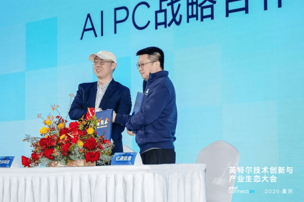 Advanced AI PC technology collaboration handshake at EmdoorIPC industry event for artificial intelligence and smart device solutions.