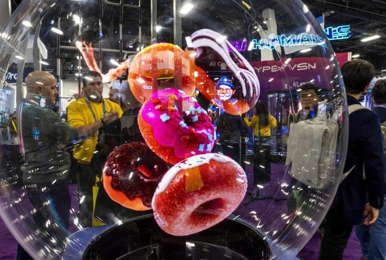 Vending machine with edible desserts displayed at a tech trade show, showcasing advanced, innovative digital kiosk solutions from EmdoorIPC for food and beverage industries.